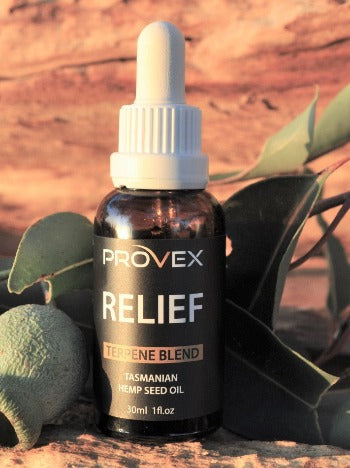 A bottle of Provex Relief Terpene Blend with a dropper, set against a natural background with leaves.